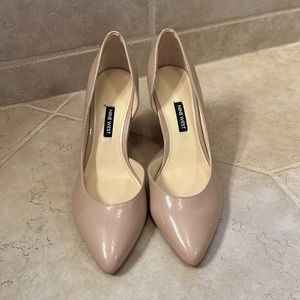 Never worn, new, natural patent leather Nine West wedge dress shoes. Size 8.5